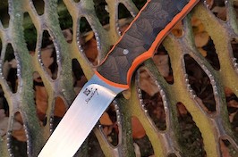 Trail point Deer Stalker in RWL34 with layered black/orange G10 scales